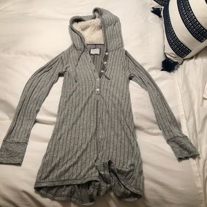 Grey ribbed pajama romper with sherpa-lined hood